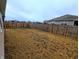 This backyard has a full wooden fence around the yard, great for privacy at 11064 N Sashing Way, Monrovia, IN 46157
