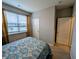 Bedroom with carpeted floors, a window, and a closet at 11064 N Sashing Way, Monrovia, IN 46157