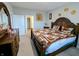 This is a lovely shot of the main bedroom with a large bed, a nightstand, and plenty of space at 11064 N Sashing Way, Monrovia, IN 46157