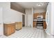 Spacious kitchen featuring stainless steel appliances, plenty of cabinet space and white tile flooring at 11363 Kristen Ln, Indianapolis, IN 46235
