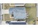 An aerial view of the home featuring a backyard patio set and landscaping at 11614 Presidio Dr, Indianapolis, IN 46235
