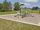 Community playground featuring slides, swings, and green accents for active fun at 1346 Fleming Dr, Greenfield, IN 46140