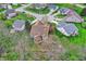 High-angle view showcasing homes nestled among lush greenery with decks and well-maintained lawns at 13841 Waywing Ct, Carmel, IN 46033