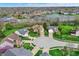 Aerial view of a suburban neighborhood featuring cul-de-sac streets, mature trees, and green spaces at 13841 Waywing Ct, Carmel, IN 46033