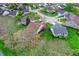 Aerial perspective of a neighborhood highlighting homes with decks, gardens, and mature trees at 13841 Waywing Ct, Carmel, IN 46033