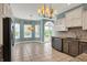 Stylish breakfast nook with granite counters, tile flooring, and natural lighting at 13841 Waywing Ct, Carmel, IN 46033