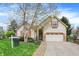Charming single-Gathering home featuring a well-manicured lawn, two car garage, and traditional design at 13841 Waywing Ct, Carmel, IN 46033