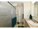 Bathroom featuring shower with glass doors, single sink vanity and tile floors at 1507 Park Dr, Lebanon, IN 46052