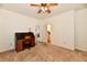 Cozy bedroom with a dedicated desk area and a view into an en-suite bathroom at 1507 Park Dr, Lebanon, IN 46052
