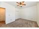 Comfortable bedroom featuring neutral carpet, a ceiling fan with light, and closet at 1507 Park Dr, Lebanon, IN 46052