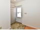 Bright entryway with tiled flooring and a white front door leading to the home's exterior at 1507 Park Dr, Lebanon, IN 46052