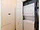 Efficient laundry area with stacked washer and dryer units at 1507 Park Dr, Lebanon, IN 46052