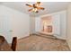 Carpeted living room with a view to the kitchen at 1507 Park Dr, Lebanon, IN 46052