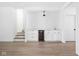 Basement bar area featuring custom cabinets, marble countertops, and a built-in wine fridge at 1526 Laurel St, Indianapolis, IN 46203