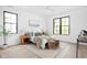 Bright bedroom featuring a comfortable bed, modern decor, and ample natural light at 1526 Laurel St, Indianapolis, IN 46203