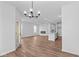 Open floor plan featuring living room, kitchen and dining area with wood floors at 16771 Cattle Hollow Ln, Noblesville, IN 46060
