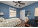 Bright bedroom features hardwood floors, and a sunny window at 18357 Piers End Dr, Noblesville, IN 46062