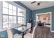 Bright dining area with a view into the living room, complete with modern table and chairs at 18357 Piers End Dr, Noblesville, IN 46062