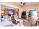 Open-concept living space with hardwood floors, vaulted ceiling, and transitions to other rooms at 18357 Piers End Dr, Noblesville, IN 46062