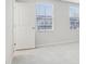 Light-filled bedroom with two windows and neutral walls at 1854 Cascades Dr, Greenfield, IN 46140