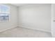 Bedroom showcasing natural light, neutral paint, carpet and a large window at 1854 Cascades Dr, Greenfield, IN 46140