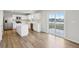Modern kitchen featuring white cabinets, stainless steel appliances, and stylish island at 1854 Cascades Dr, Greenfield, IN 46140