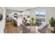 Bright eat-in kitchen features white cabinets, stainless steel appliances and a lake view at 1854 Cascades Dr, Greenfield, IN 46140
