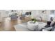 Bright and airy living room with stylish furniture, modern decor, and beautiful flooring at 1854 Cascades Dr, Greenfield, IN 46140