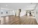 Open-concept living area with hardwood floors, perfect for modern living and entertaining at 1854 Cascades Dr, Greenfield, IN 46140