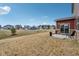 A spacious backyard with a patio, lawn, and views of the neighborhood, creating a perfect outdoor retreat at 1945 Clement St, Westfield, IN 46074