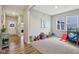 Bright bonus room with neutral walls and carpet, featuring two large windows and an open doorway at 1945 Clement St, Westfield, IN 46074