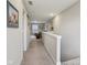 Bright upstairs hallway leads to the living space, offering an open and airy transition between rooms at 1945 Clement St, Westfield, IN 46074
