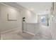Upstairs landing featuring neutral walls, carpet, and a plant for a touch of color at 1945 Clement St, Westfield, IN 46074
