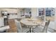 Kitchen and dining area showing floors, modern design, and patio access at 1945 Clement St, Westfield, IN 46074
