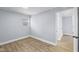 This bedroom is freshly painted and features wood-look floors at 2040 Laurel St, Indianapolis, IN 46203