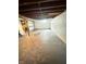 Unfinished basement area with concrete floor and painted walls, offering potential for customization at 2523 S Mcclure St, Indianapolis, IN 46241