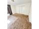 Inviting bedroom featuring a large closet, and neutral colored carpet at 2523 S Mcclure St, Indianapolis, IN 46241