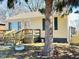 Charming single-story home with a small front porch and well-maintained yard at 2523 S Mcclure St, Indianapolis, IN 46241