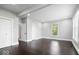 Spacious bedroom with hardwood floors, closets and bright natural light at 2528 Guilford Ave, Indianapolis, IN 46205