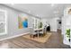 Well-lit dining area with modern table and chairs with bright decor at 2528 Guilford Ave, Indianapolis, IN 46205