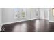 Inviting living room showcasing hardwood floors and bright natural light at 2528 Guilford Ave, Indianapolis, IN 46205