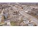 An aerial view of a residential area with well-maintained homes and tree-lined streets at 2532 Madison Ave, Indianapolis, IN 46225