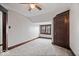 Bedroom displaying natural light from the window, neutral paint, carpeting and wood trim at 2532 Madison Ave, Indianapolis, IN 46225