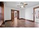 Hardwood floors and wide doorways highlight this expansive living area, offering versatile living at 2532 Madison Ave, Indianapolis, IN 46225