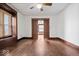 Spacious living room with hardwood floors and views into adjacent rooms, offering a versatile living space at 2532 Madison Ave, Indianapolis, IN 46225