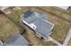 A home featuring its roof and yard relative to other neighborhood homes at 2712 S A St, Elwood, IN 46036