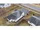 Home showcasing its roof, surrounding yard, and proximity to neighboring properties at 2712 S A St, Elwood, IN 46036