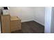 Convenient unfinished storage area with wood style floors and cabinet to keep belongings neatly organized at 2712 S A St, Elwood, IN 46036