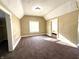 Comfortable bedroom with neutral walls, carpet flooring and windows, providing a bright and welcoming space at 2821 E 13Th St, Indianapolis, IN 46201