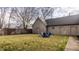 Spacious backyard with lawn, fence, patio and backyard seating at 304 E 17Th St, Indianapolis, IN 46202
